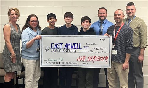 hsmc gives check to east amwell school